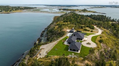 Beach Home For Sale in Cape Forchu,