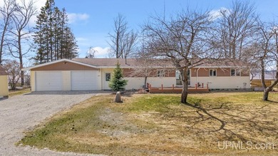 Beach Home For Sale in Rapid River, Michigan