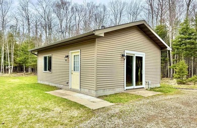 Beach Home Active Under Contract in Rapid River, Michigan