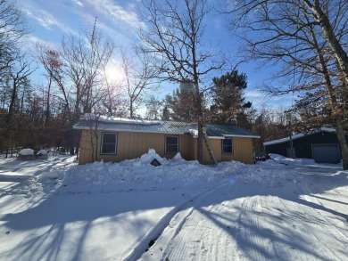 Beach Home Sale Pending in Manistee, Michigan