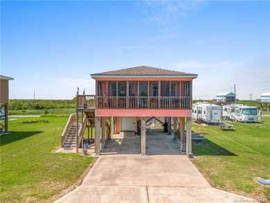 Embrace coastal living in this charming beach cottage that is - Beach Home for sale in Cameron, Louisiana on Beachhouse.com