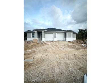 Beach Townhome/Townhouse For Sale in Lehigh Acres, Florida