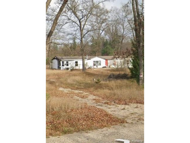 Beach Home For Sale in Manistee, Michigan