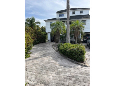 Beach Home For Sale in Bokeelia, Florida