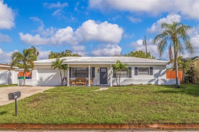 Beach Home For Sale in Kenneth City, Florida