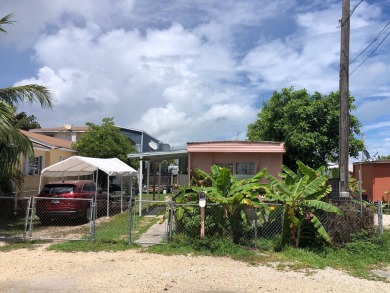 Beach Home For Sale in Stock Island, Florida