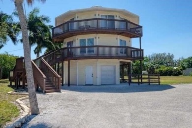 Beach Home For Sale in Bokeelia, Florida