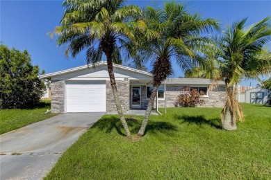 Beach Home For Sale in Holiday, Florida