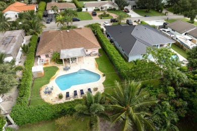 Beach Home For Sale in Lake Clarke Shores, Florida