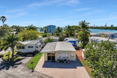 Beach Home For Sale in Stock Island, Florida