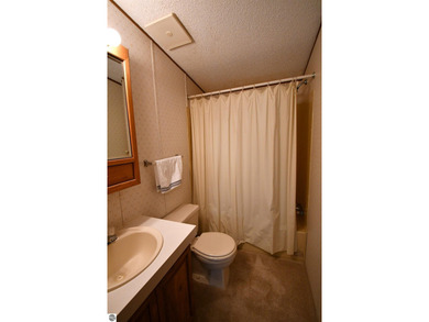 Beach Home For Sale in Alanson, Michigan