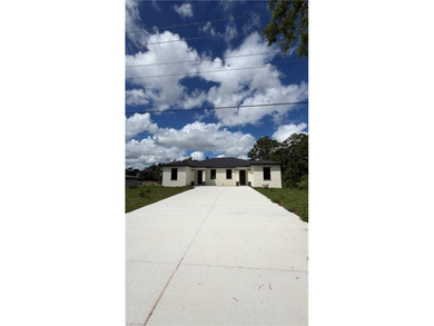 Beach Townhome/Townhouse For Sale in Lehigh Acres, Florida