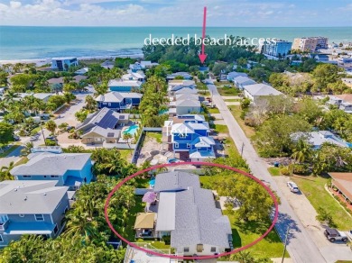 Beach Home For Sale in Holmes Beach, Florida