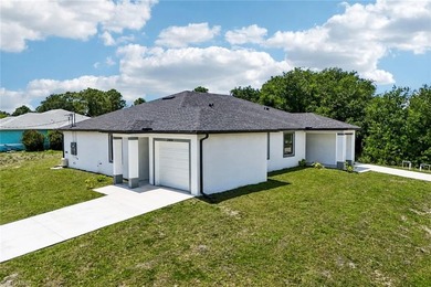 Beach Townhome/Townhouse For Sale in Lehigh Acres, Florida