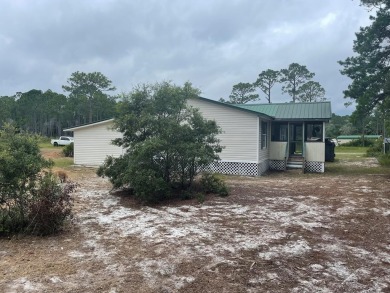 Beach Home For Sale in Eastpoint, Florida