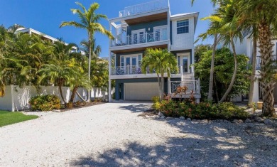 Beach Home For Sale in Holmes Beach, Florida