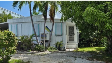 Beach Home For Sale in Geiger Key, Florida