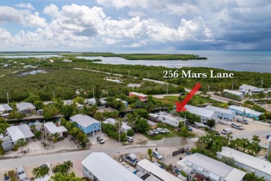 Beach Home For Sale in Geiger Key, Florida