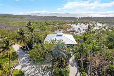 Beach Home For Sale in Bokeelia, Florida