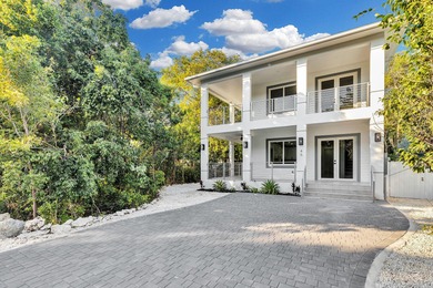 Beach Home For Sale in Key Largo, Florida