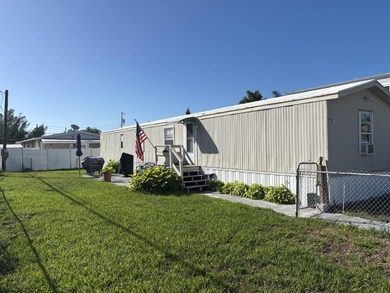 Beach Home For Sale in Stock Island, Florida