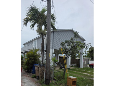 Beach Home For Sale in Stock Island, Florida