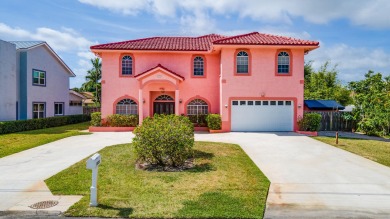 Beach Home For Sale in Lake Clarke Shores, Florida