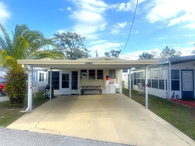 Beach Home For Sale in Holiday, Florida