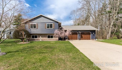Beach Home For Sale in Spring Lake, Michigan