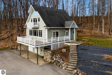 Beach Home For Sale in Kewadin, Michigan