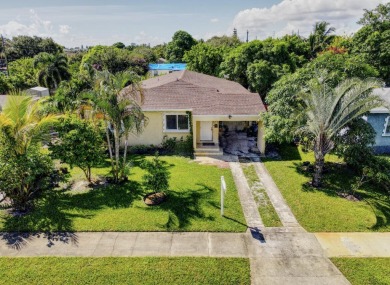 Beach Home For Sale in Lake Park, Florida