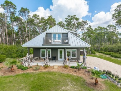 Beach Home For Sale in Eastpoint, Florida