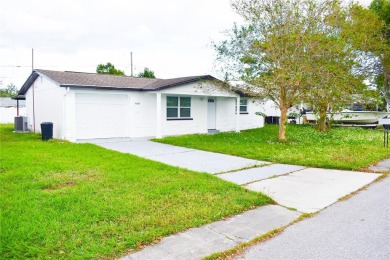 Beach Home For Sale in Holiday, Florida