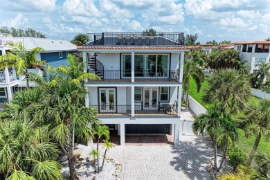 Beach Home For Sale in Holmes Beach, Florida