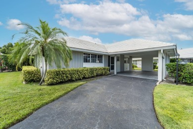 Beach Home For Sale in Atlantis, Florida