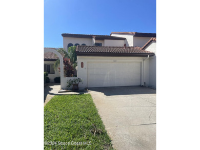 Beach Townhome/Townhouse For Sale in Indian Harbour Beach, Florida