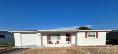 Beach Home For Sale in Holiday, Florida