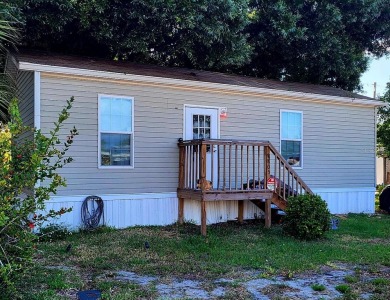 Beach Home For Sale in Holiday, Florida