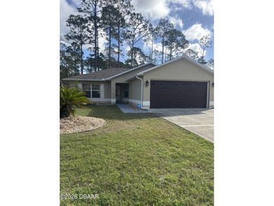 Beach Home For Sale in Palm Coast, Florida