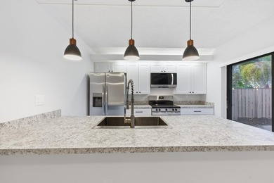 Beach Townhome/Townhouse Active Under Contract in West Palm Beach, Florida