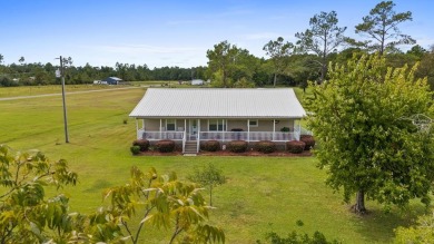 Beach Home For Sale in Wewahitchka, Florida