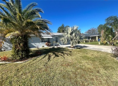 Beach Home For Sale in Holiday, Florida