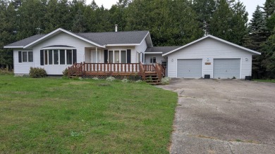 Beach Home For Sale in Hessel, Michigan