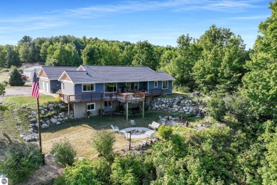 Beach Home For Sale in Kewadin, Michigan