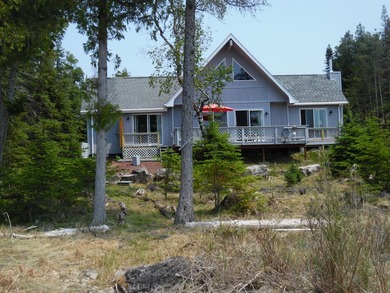Beach Home For Sale in Drummond Island, Michigan