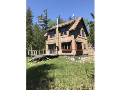 Beach Home For Sale in Hessel, Michigan
