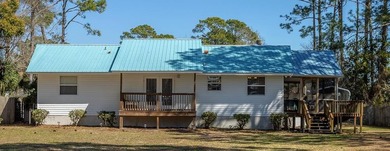 Beach Home For Sale in Eastpoint, Florida