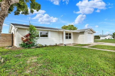 Beach Home For Sale in Holiday, Florida