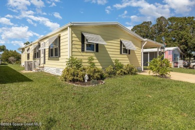 Beach Home For Sale in Barefoot Bay, Florida