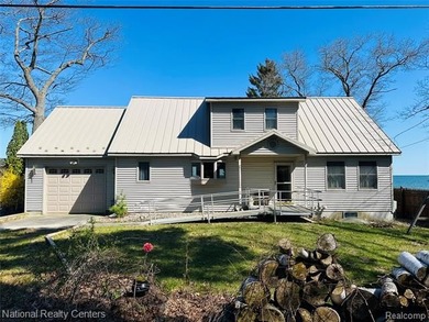 Beach Home For Sale in East Tawas, Michigan